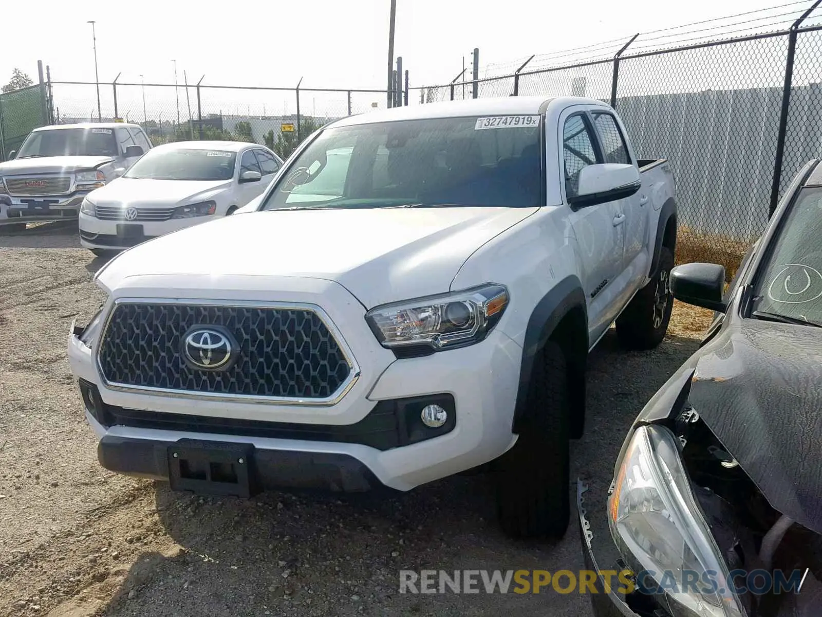 2 Photograph of a damaged car 3TMAZ5CN4KM089618 TOYOTA TACOMA DOU 2019