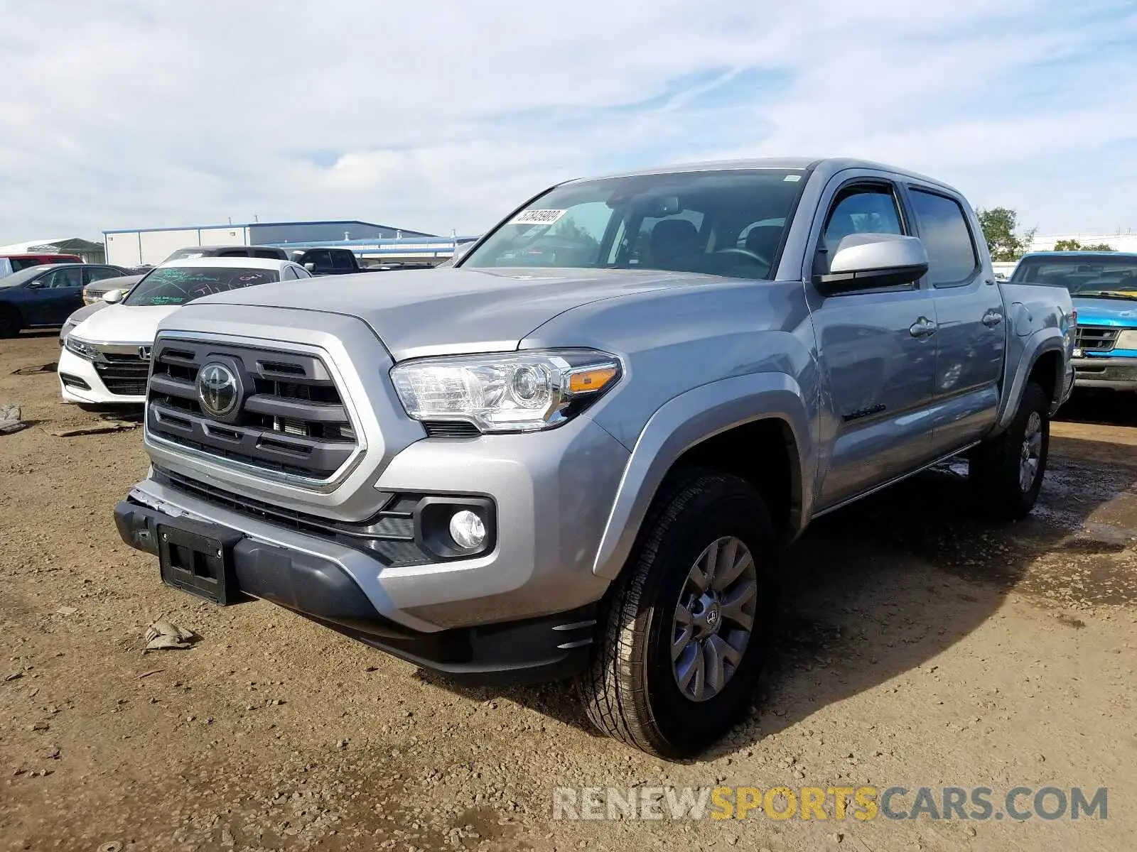 2 Photograph of a damaged car 3TMAZ5CN9KM106624 TOYOTA TACOMA DOU 2019