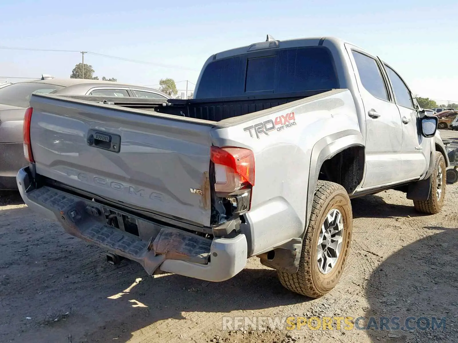 4 Photograph of a damaged car 3TMCZ5AN3KM282676 TOYOTA TACOMA DOU 2019
