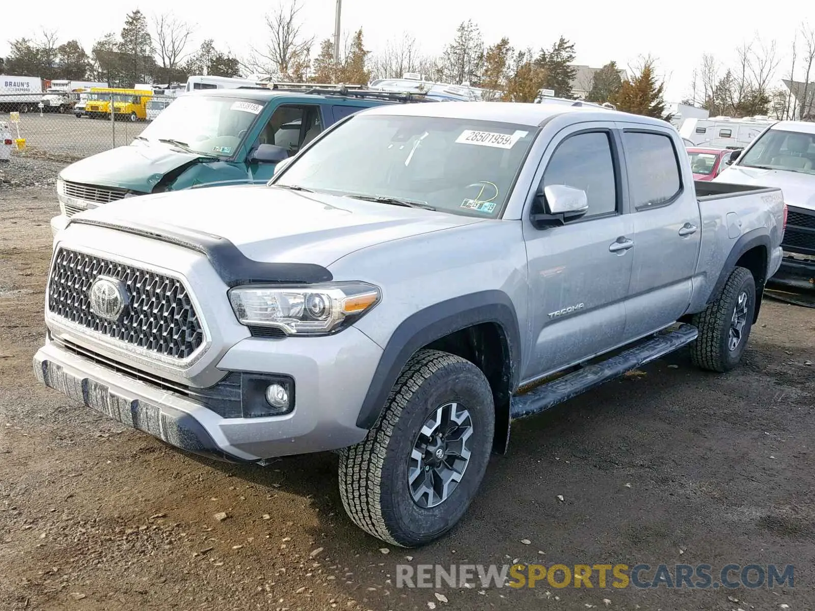 2 Photograph of a damaged car 3TMDZ5BN1KM055649 TOYOTA TACOMA DOU 2019