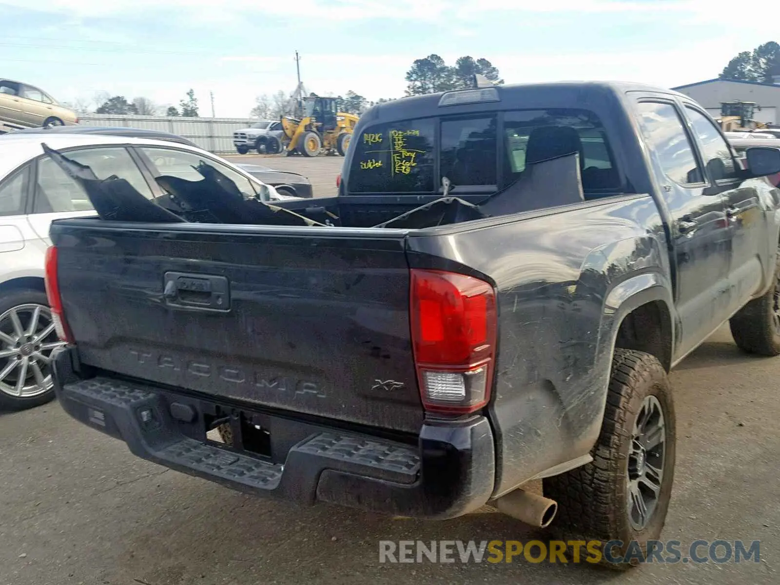 4 Photograph of a damaged car 5TFAX5GN1KX133228 TOYOTA TACOMA DOU 2019