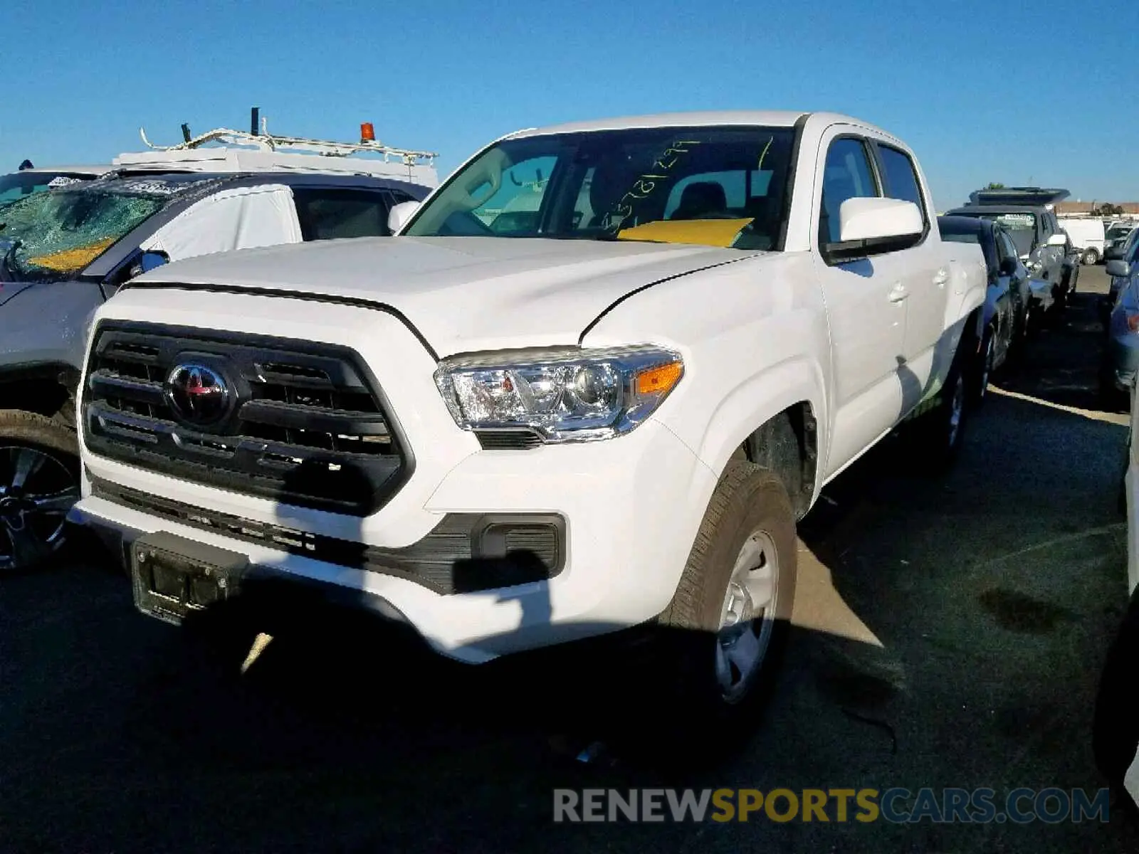 2 Photograph of a damaged car 5TFAX5GN8KX133100 TOYOTA TACOMA DOU 2019