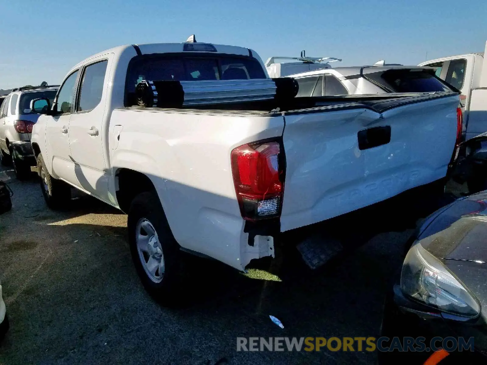 3 Photograph of a damaged car 5TFAX5GN8KX133100 TOYOTA TACOMA DOU 2019