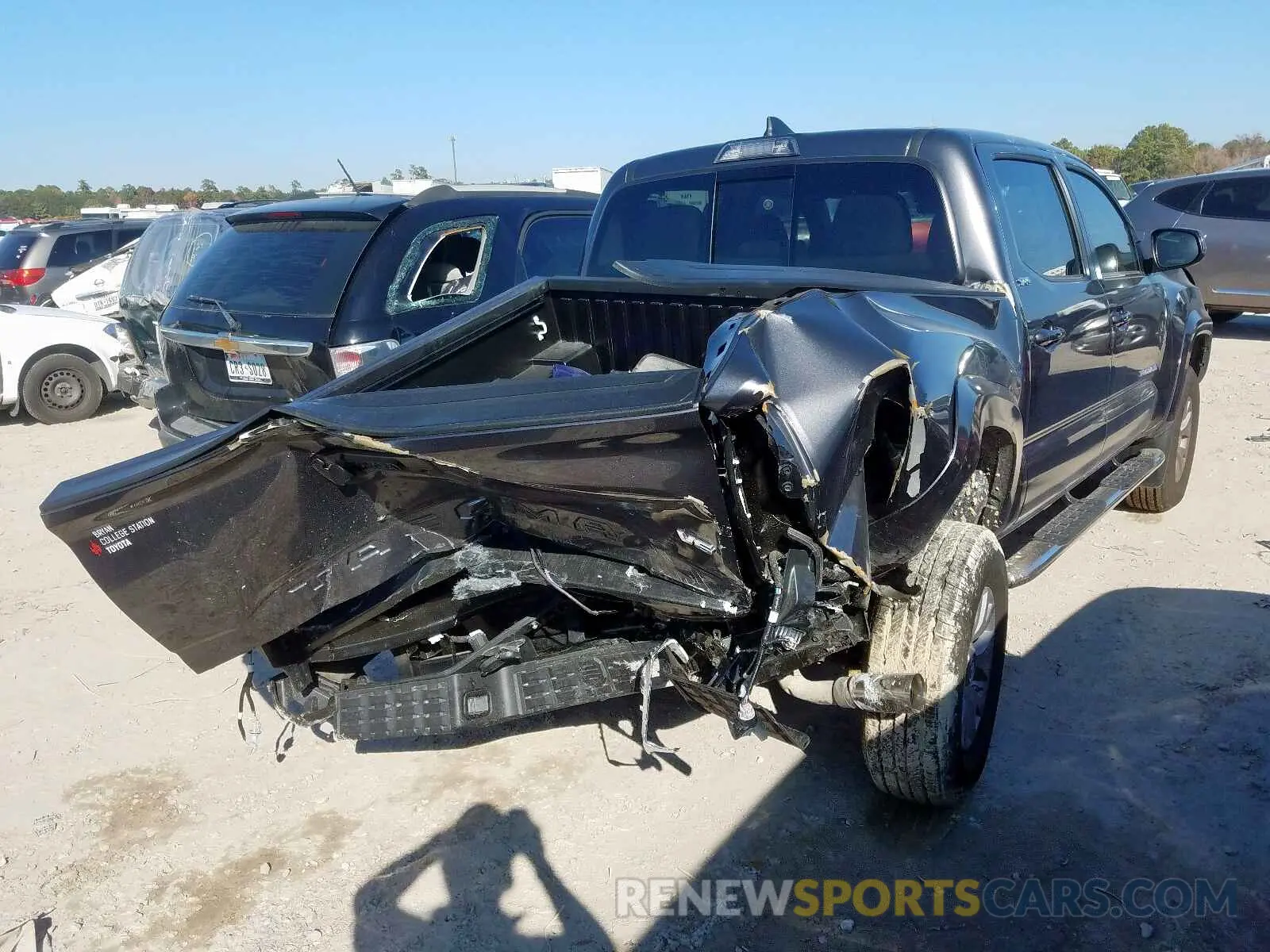 4 Photograph of a damaged car 5TFAZ5CN5KX087077 TOYOTA TACOMA DOU 2019