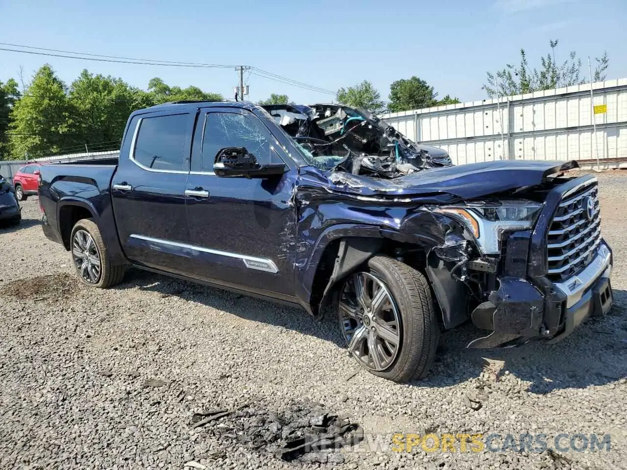 4 Photograph of a damaged car 5TFVC5DB9PX028516 TOYOTA TUNDRA 2023