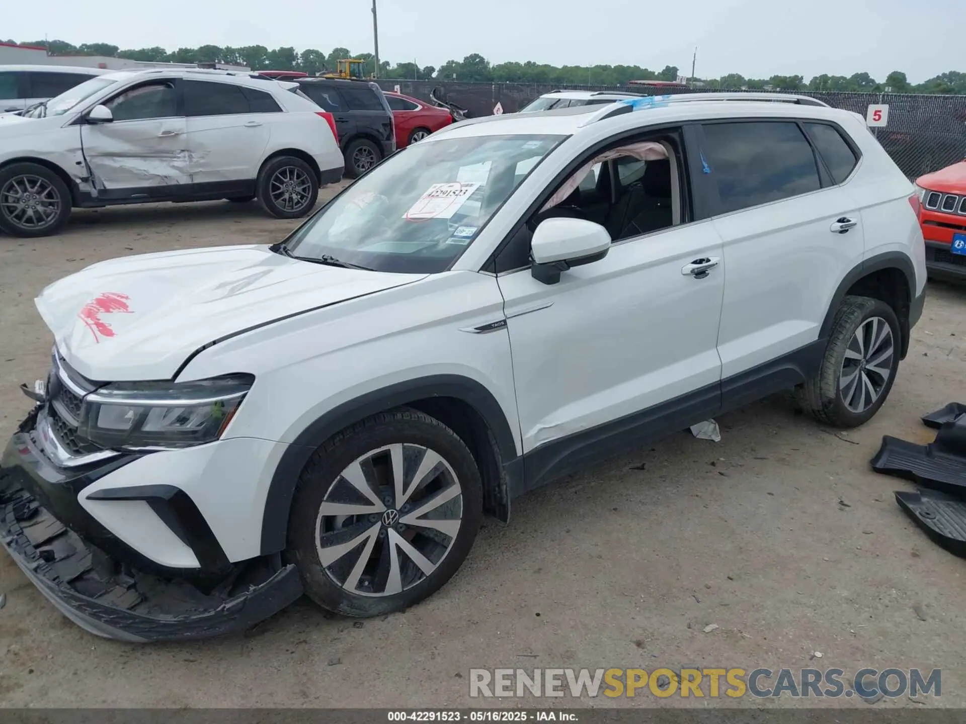 2 Photograph of a damaged car 3VVEX7B28PM306980 VOLKSWAGEN TAOS 2023
