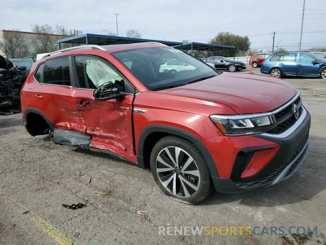 4 Photograph of a damaged car 3VVTX7B29NM002268 VOLKSWAGEN TAOS SE 2022