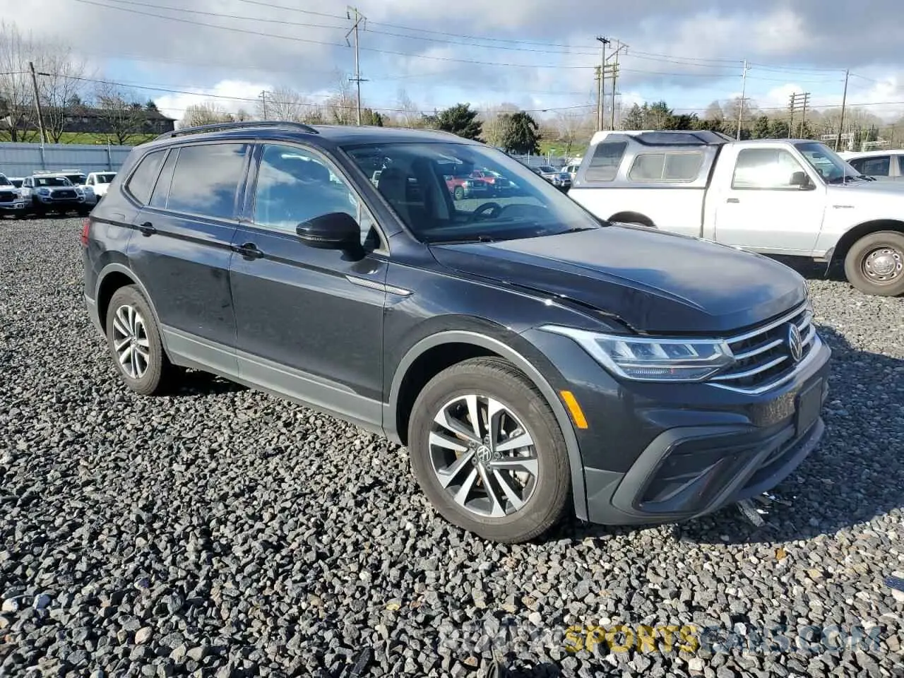 4 Photograph of a damaged car 3VVRB7AX9PM064990 VOLKSWAGEN TIGUAN 2023
